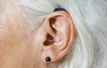 A hearing aid helps hearing loss. We can also help you with benign positional vertigo.